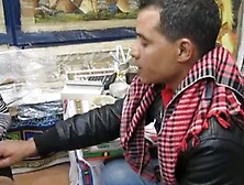 Braless girl in stockings in egyptian shop