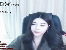 Horny Korean shows her huge boobs