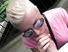Busty blone blowjob outdoor in public passage POV