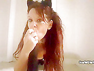 Mature whore Scarlett Harlott strips in black outfits and masturbates