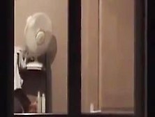 Spying on neighbour while she changes