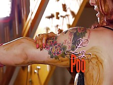 Tattooed girls pooping on each other