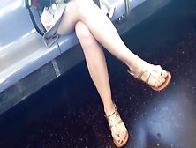 Candid crossed legs and feet