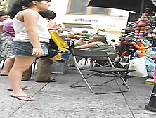 Dirty bitch reveals her chubby ass in the public upskirt (fake) action