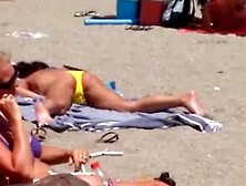 Yellow Thong Girl Caught Masturbating At Beach