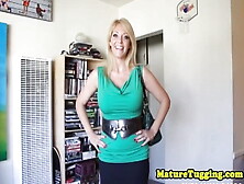 Busty MILF facialized after wanking cock