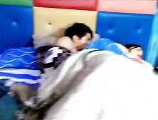 Stepson fucks his stepmother under the sheets,  and the cuckold doesn't notice.