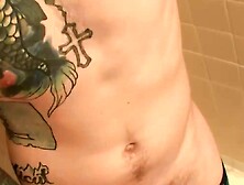 Inked Jock Blinx Rubbing His Meaty Cock In The Shower And Splashing His Cum Out