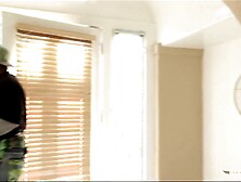 Tennis player couldn't resist playing with that large ebony weenie