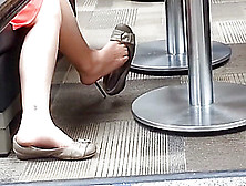 Sexy Flat Dangle At A Cafe