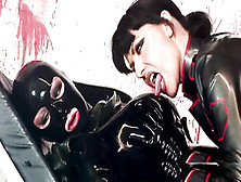 Kinky lesbians share kisses and suck their tongues in latex suits