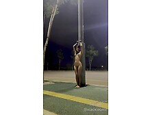 Xiao Xiao Xin cuffed to lamppost