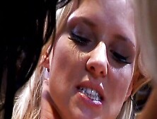 Horny sluts lick each other's tits and fuck each other with multi colored dildos