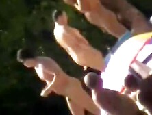 a voyur porno of a sexy blonde chick sitting tanning on a beach