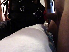 Very close view of Laura,  throated by a huge penis with a lip open mouth gag,  lot of drooling