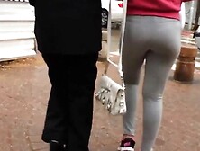bubble butt in grey yoga pants walking the street