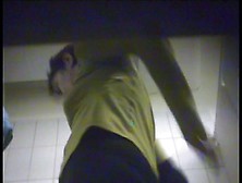 Mature female from changing room spy video puts on bikini