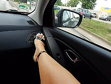 Stepmom in short skirt and heels with sexy legs rubs her pussy in the car in public and teases her stepson