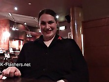 Amateur chubby and busty brunette masturbates in a restaurant