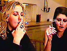 Sexy girls smoke cigarettes and a joint