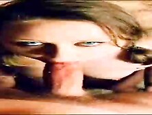 Sara Marie is impatiently blowing her paramour's rock-hard penis while getting down on all fours in front of him