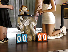 Two hot beautiful horny girls try to make a big cock guy cum with a dice challenge double handjob game