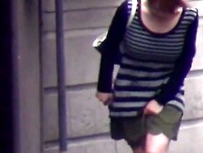 Asian girls pour golden from bushy vag into urinal spot