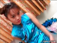 Japanese teen models her small tits