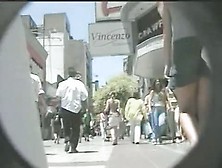 Leggy brunette sweetheart wears no panties in a hot upskirt (fake) video