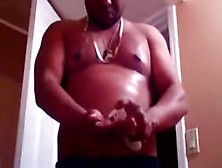 Black Man Rubbing Lotion On Sexy Chest!