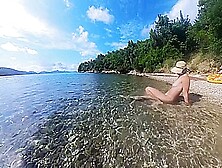 Cute Girl Plays In The Ocean