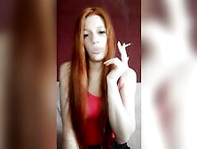 Cunt With Mouth With Red Hair Smokes A Cigarette