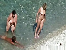 Mature nudist women in the water