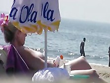 watching a large-boobed Step mother I'd like to fuck on a beach