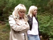 Two blonde MILFs suck off stranger in forest