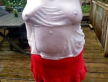 Tarablee Hotz- cooling off in the rain on a sexy day.  My moist t-shirt barely conceals my large bazookas.