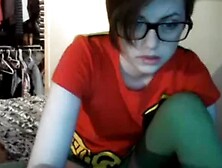 Camgirl in robin costume masturbates with vibrator