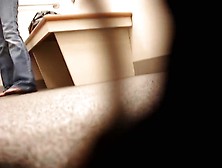 Dressing room girl trying panty on without taking off jeans