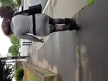 Guy cums on womans back in the street