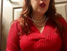 Alluring Ginger Youngster Smoking in Red Sweater Red Lipstick and Red Nail Polish