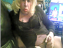 Mature Tranny Shows A Fishnet Boner