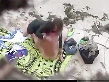 Voyeur Tapes A Young Couple Having Sex On A Private Part Of The Beach