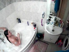 Amateur Brunette In Bathtub Voyeur Video