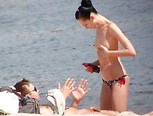 Xxx beach porno vid of some topless women apply tanning lotion