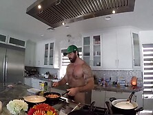Hairy muscle god cooking in nature's garb
