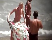 Nudist Blonde Woman Caught In Nudist Beach