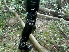 Vinyl Mini Skirt,  Thigh High Boots In Deep Mud!