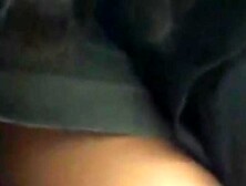 European woman is black stockings is standing while we watch her ass