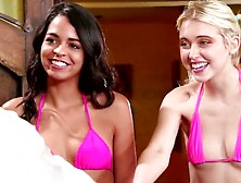 Mature masseuse satisfies two young pussies with her nuru