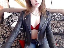 sexy Blonde Camgirl with Leather Jacket and Jeans Strip